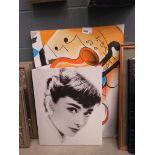 3 assorted photographic canvases; 2 of Audrey Hepburn and still life of musical instruments