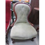 Green button backed fabric shield back bedroom chair