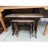 Nest of 3 dark wood tables