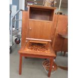 Teak single-door bedside cabinet and a tile-topped teak surround table