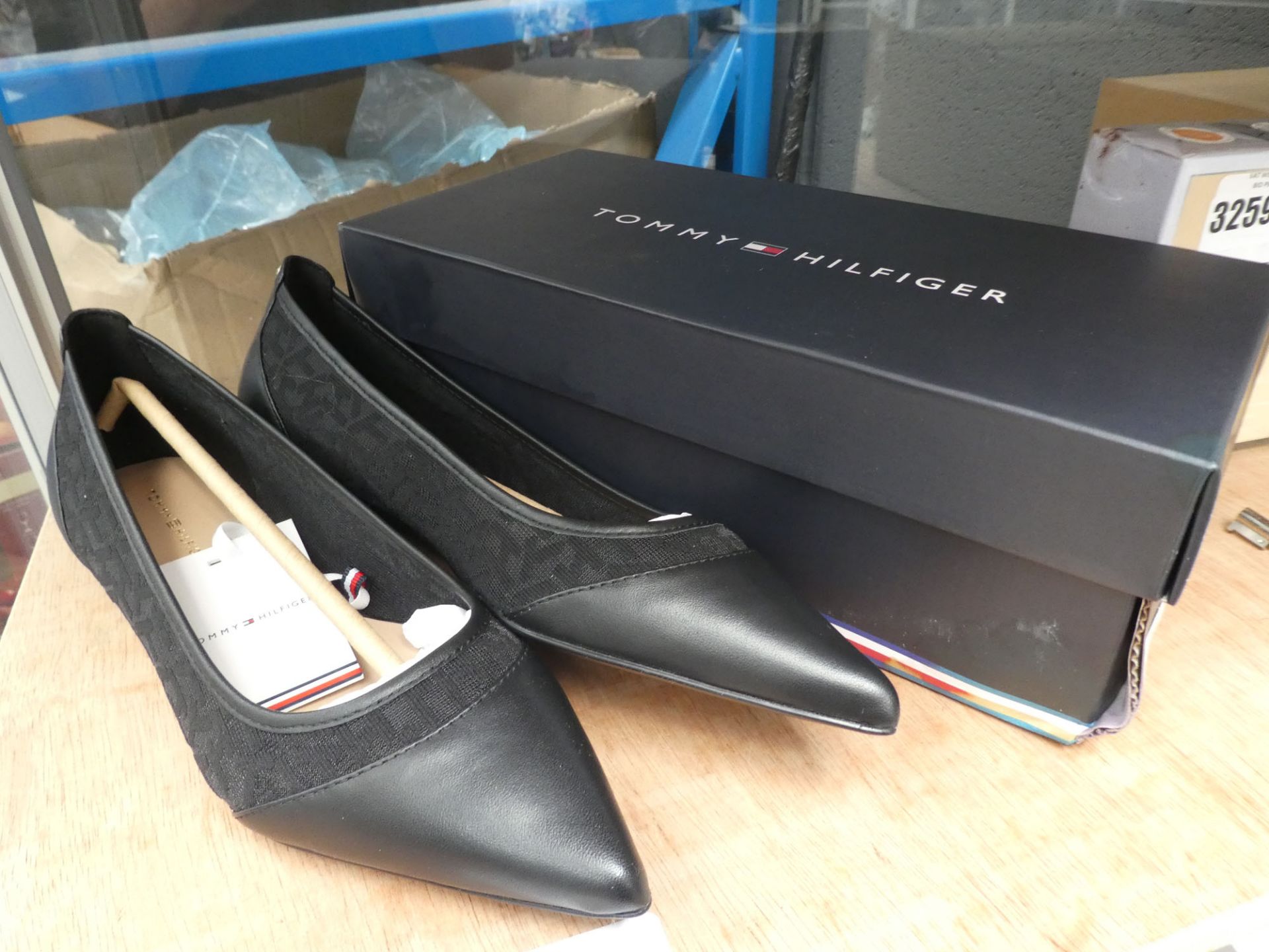 Boxed pair of ladies Tommy Hilfiger slip on shoes in black size 5