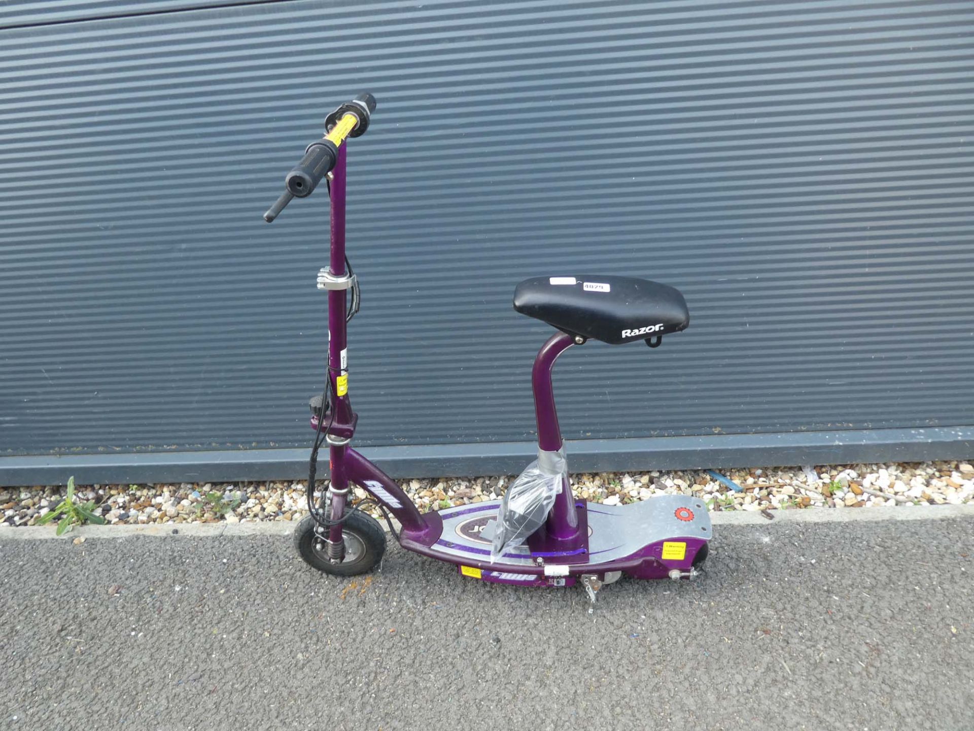 Razor purple electric scooter with charger