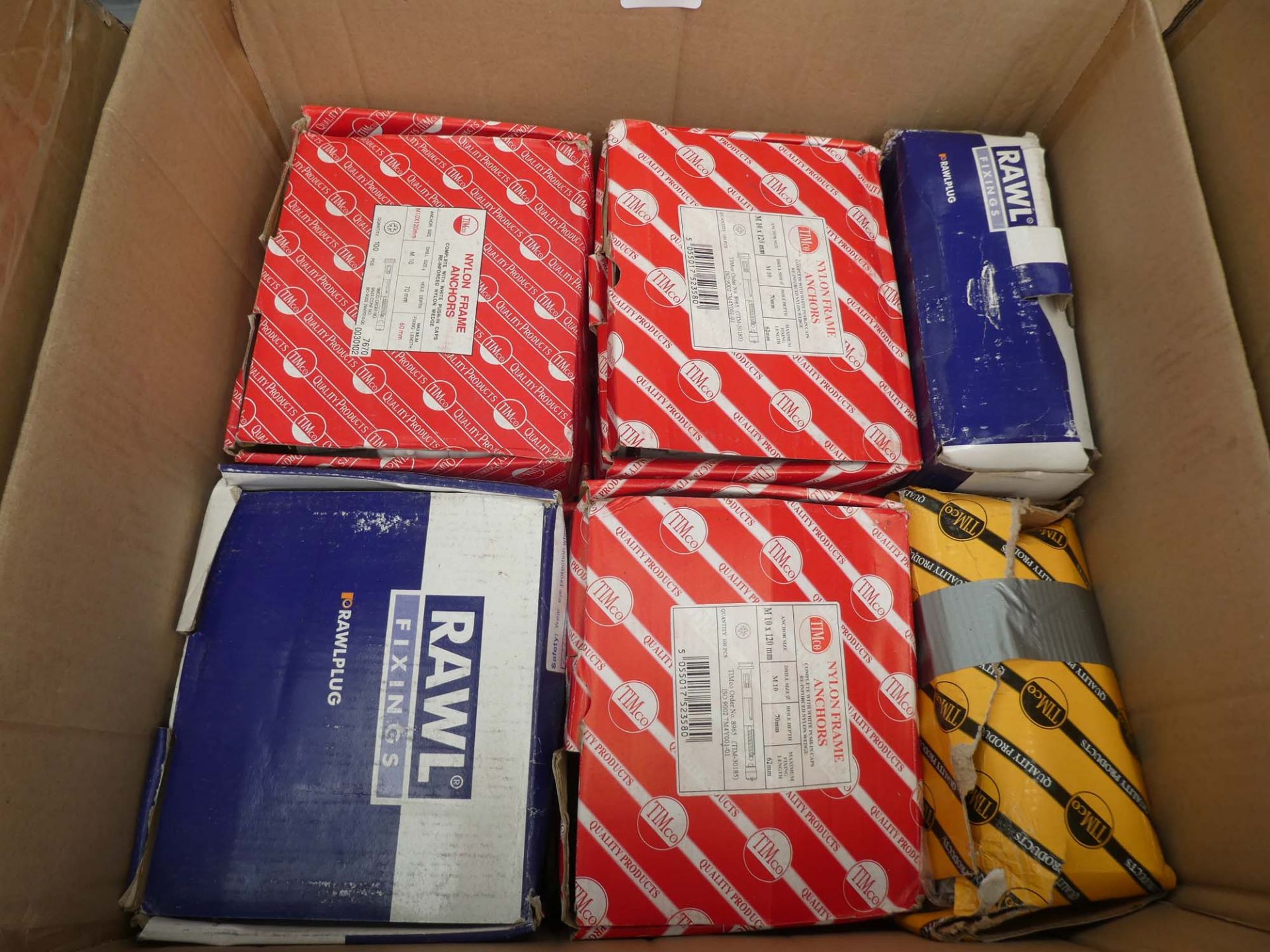 Box of assorted nylon frame anchors and fixings