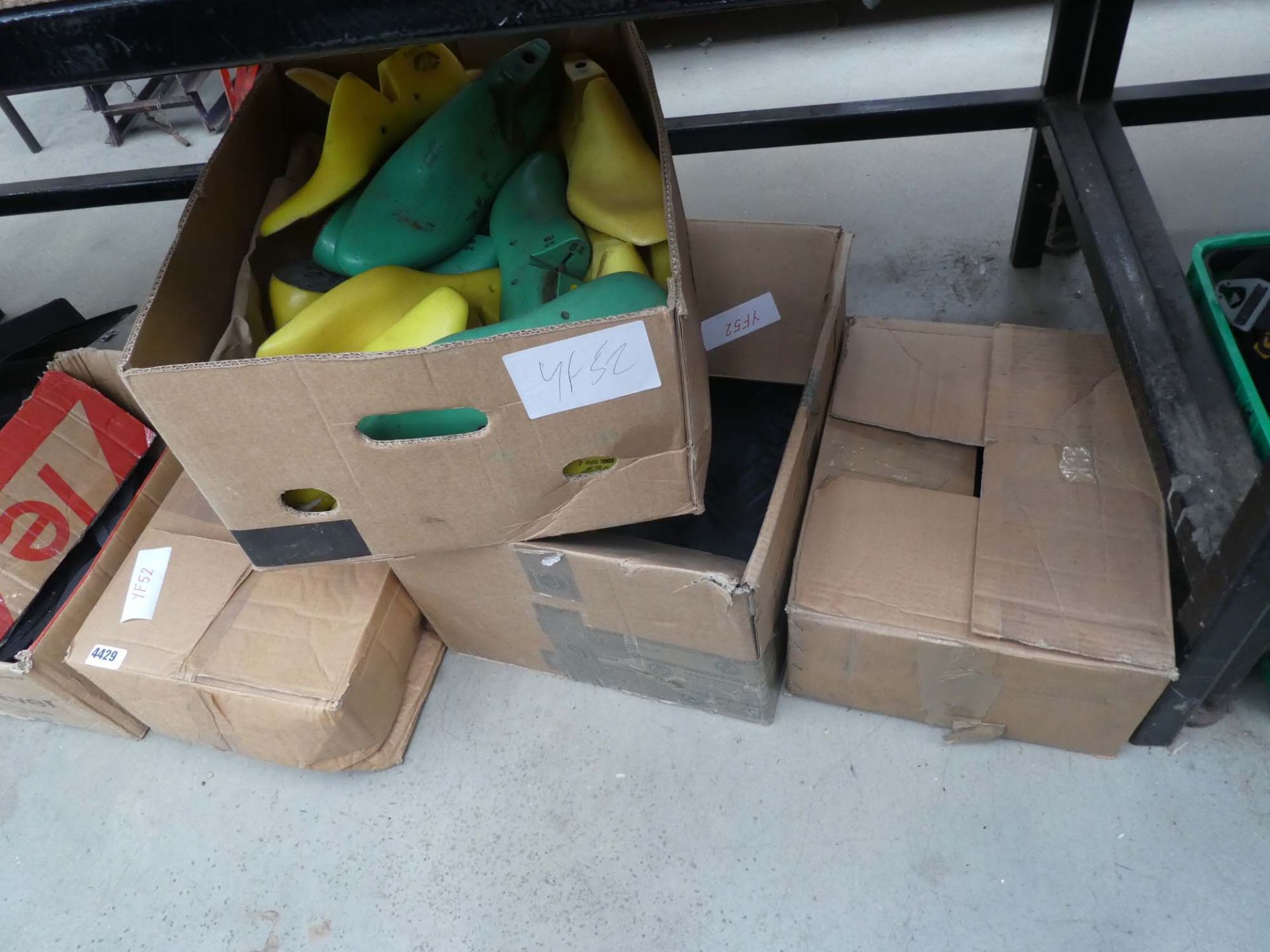 5 boxes containing shoe soles and shoe blanks