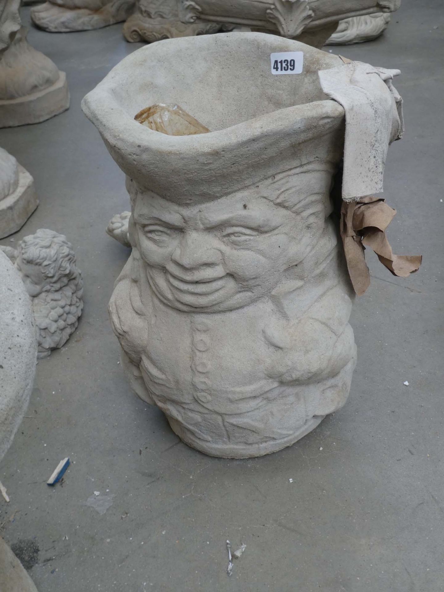 Concrete toby jug planter