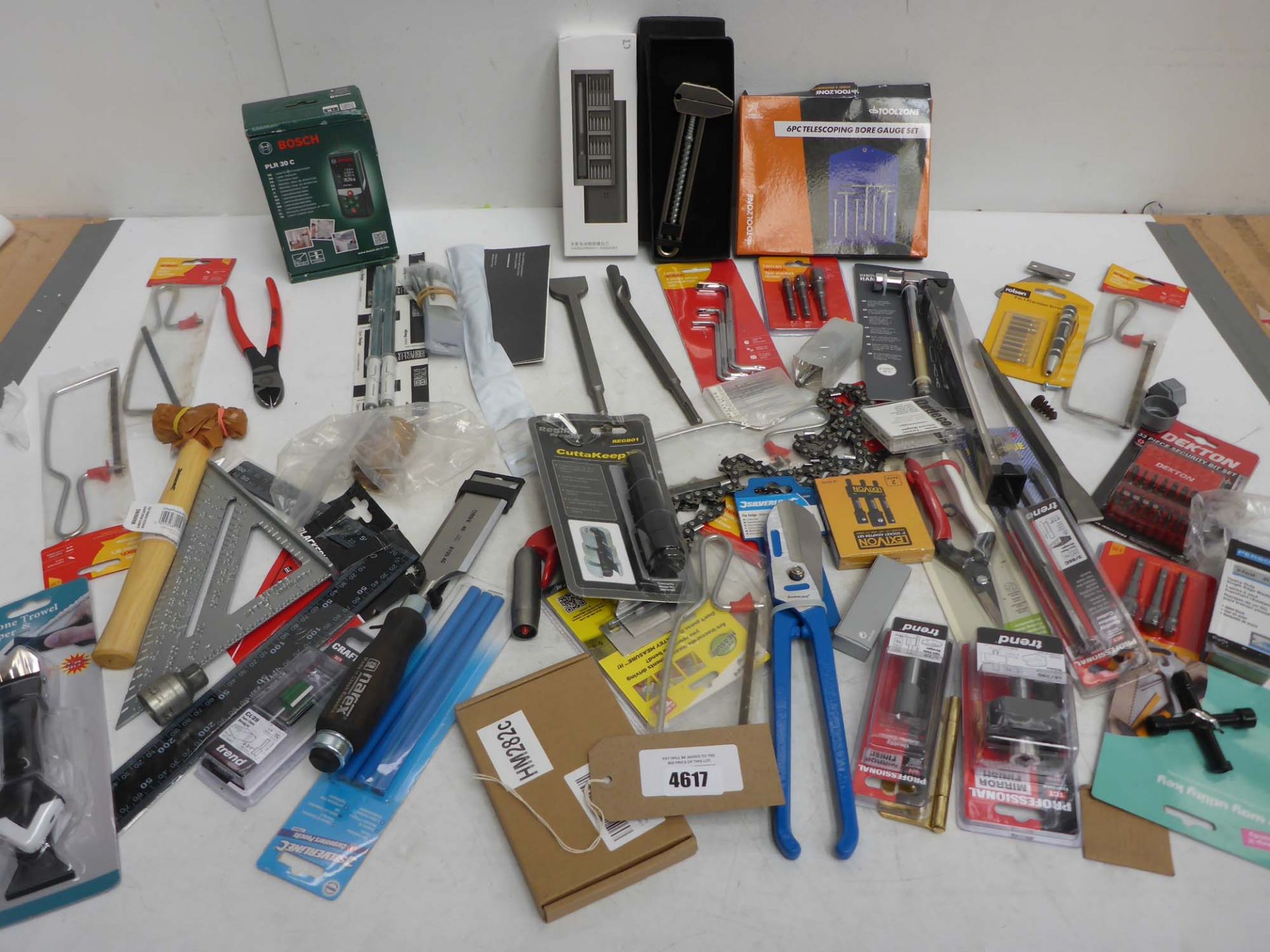 MetMo clamp, Bosch laser level, bore gauge set, hammer, tin snips, hack saws, drill bits, socket