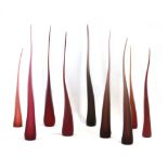 Charlie Macpherson (contemporary), a set of nine glass blown hollow 'Spikes',