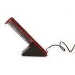 A Philips Memphis style desk lamp in red