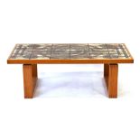 A 1973 Ox-Art coffee table, the tiled surface on a teak frame with exposed dovetail joints,