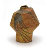 A studio pottery vase of volcanic shape, with a drip glaze, by Shirley Foote,
