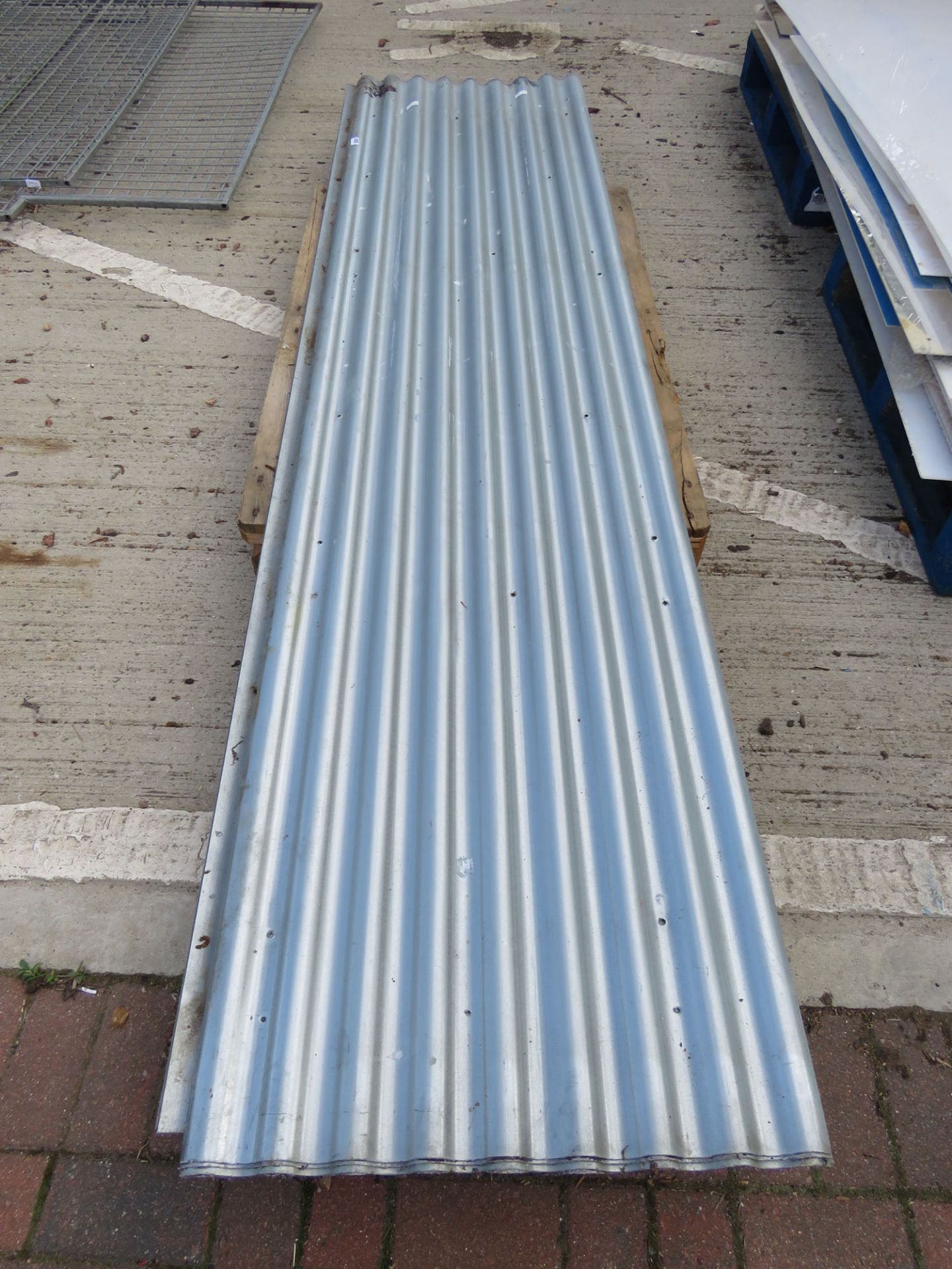 10 rigged galvanized roofing sheets