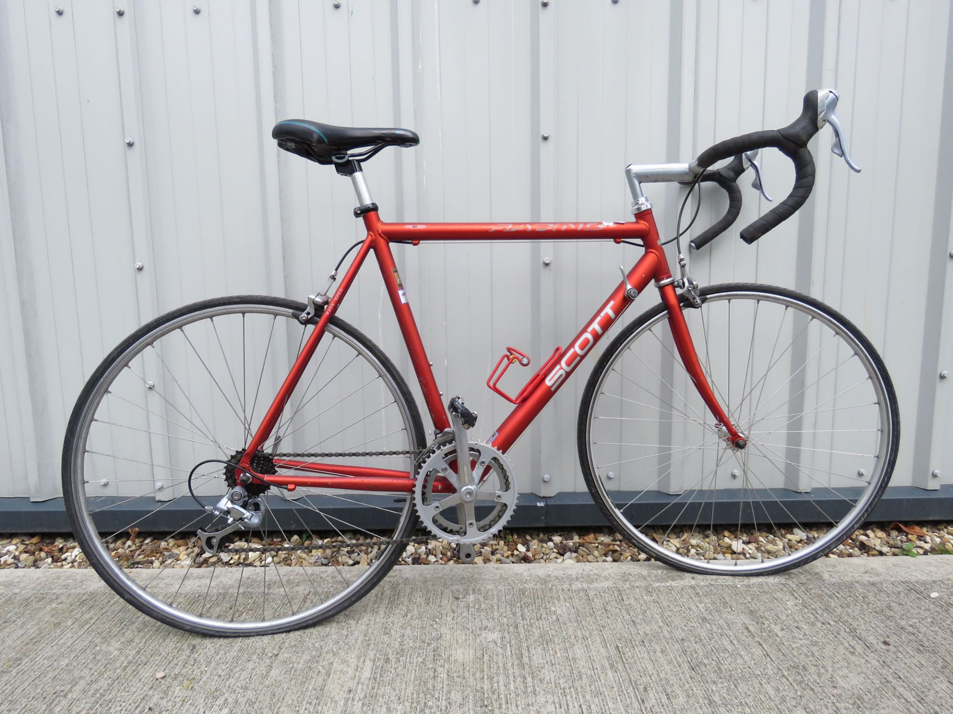 Scott racing bike in burnt orange