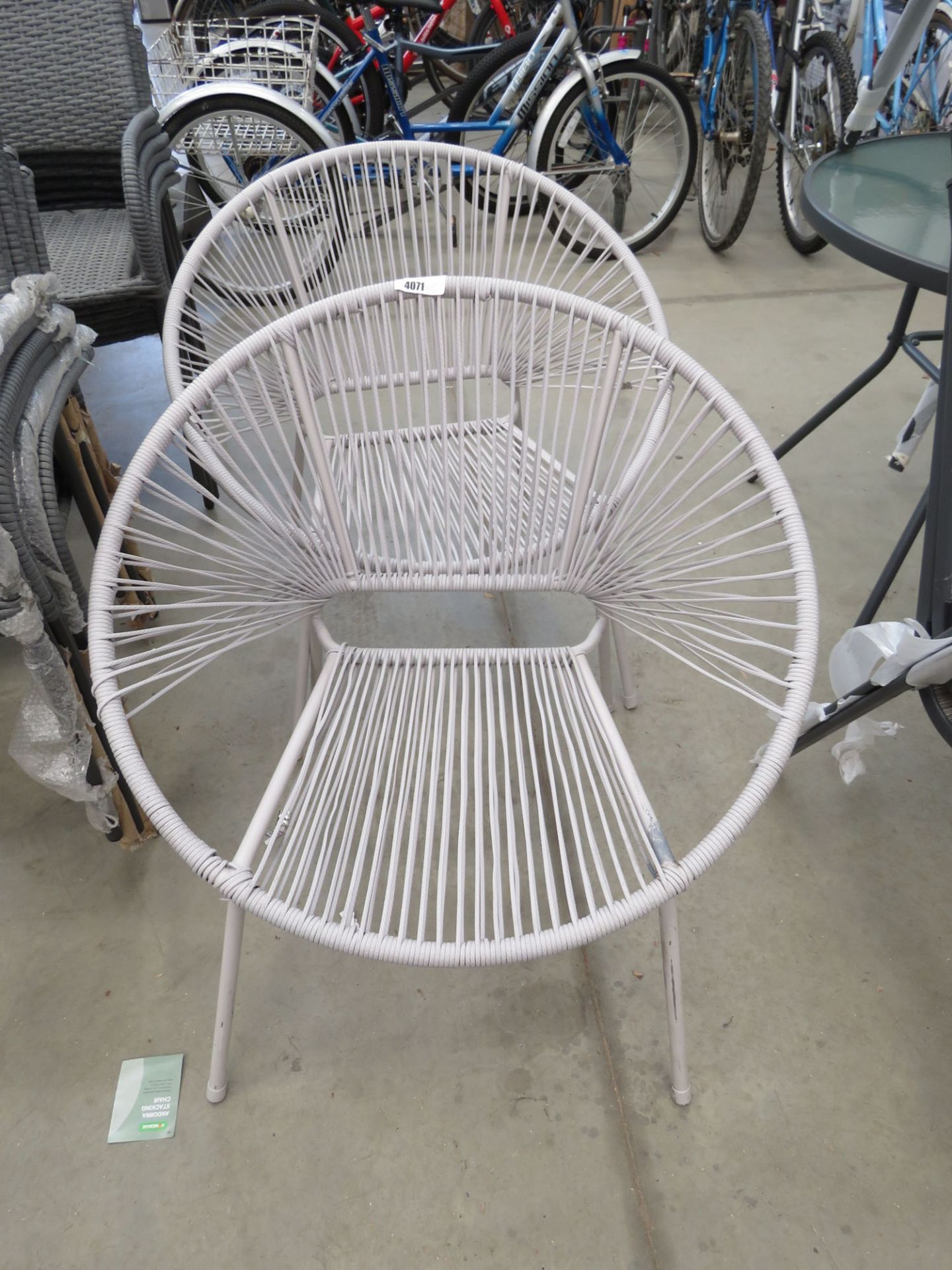 2 grey tub style chairs in strung rattan