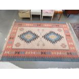 Woolen multi coloured mat with geometric pattern