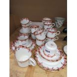 Quantity of Heathcote pink floral patterned cups, saucers and side plates