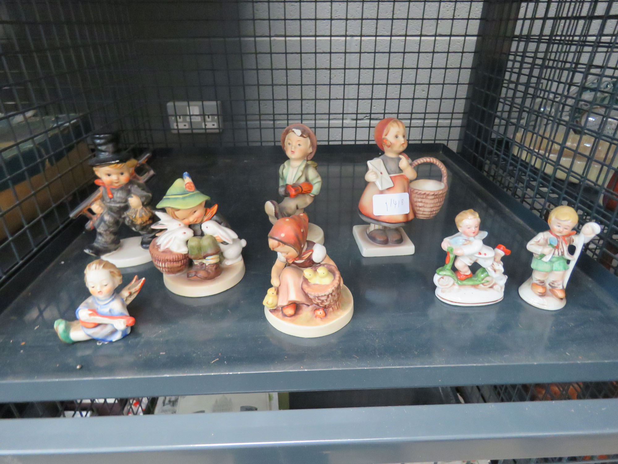 Cage of hummel figures