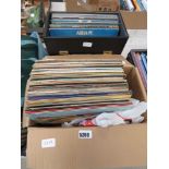 2 boxes containing vinyl records