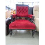 Carved Edwardian armchair in red fabric