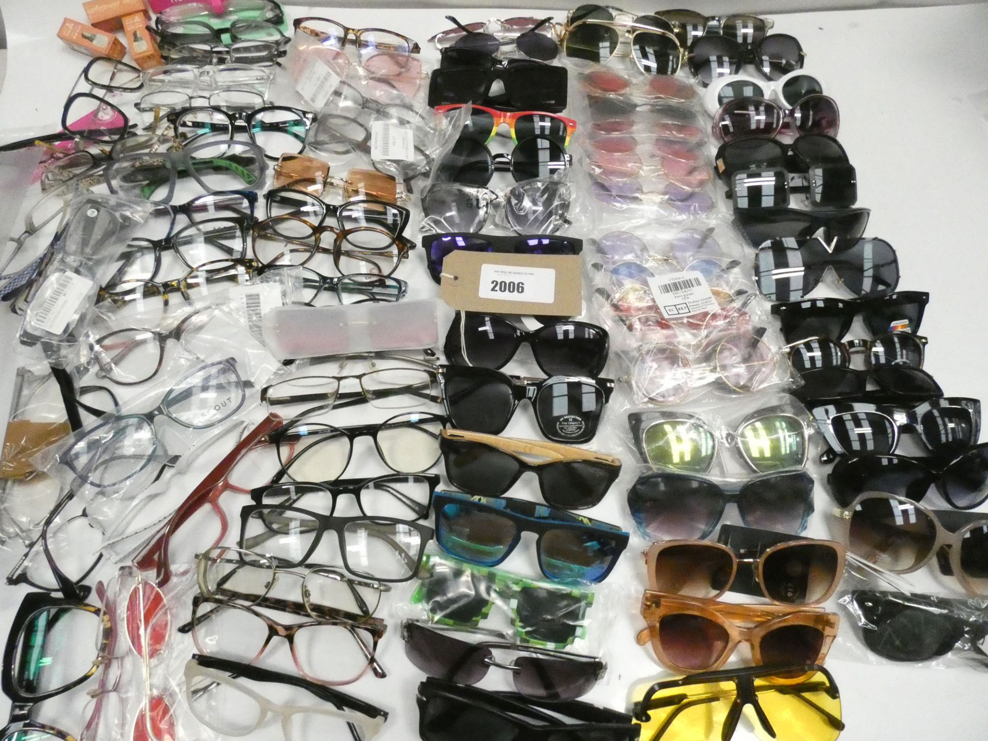 Large quantity reading glasses and sunglasses