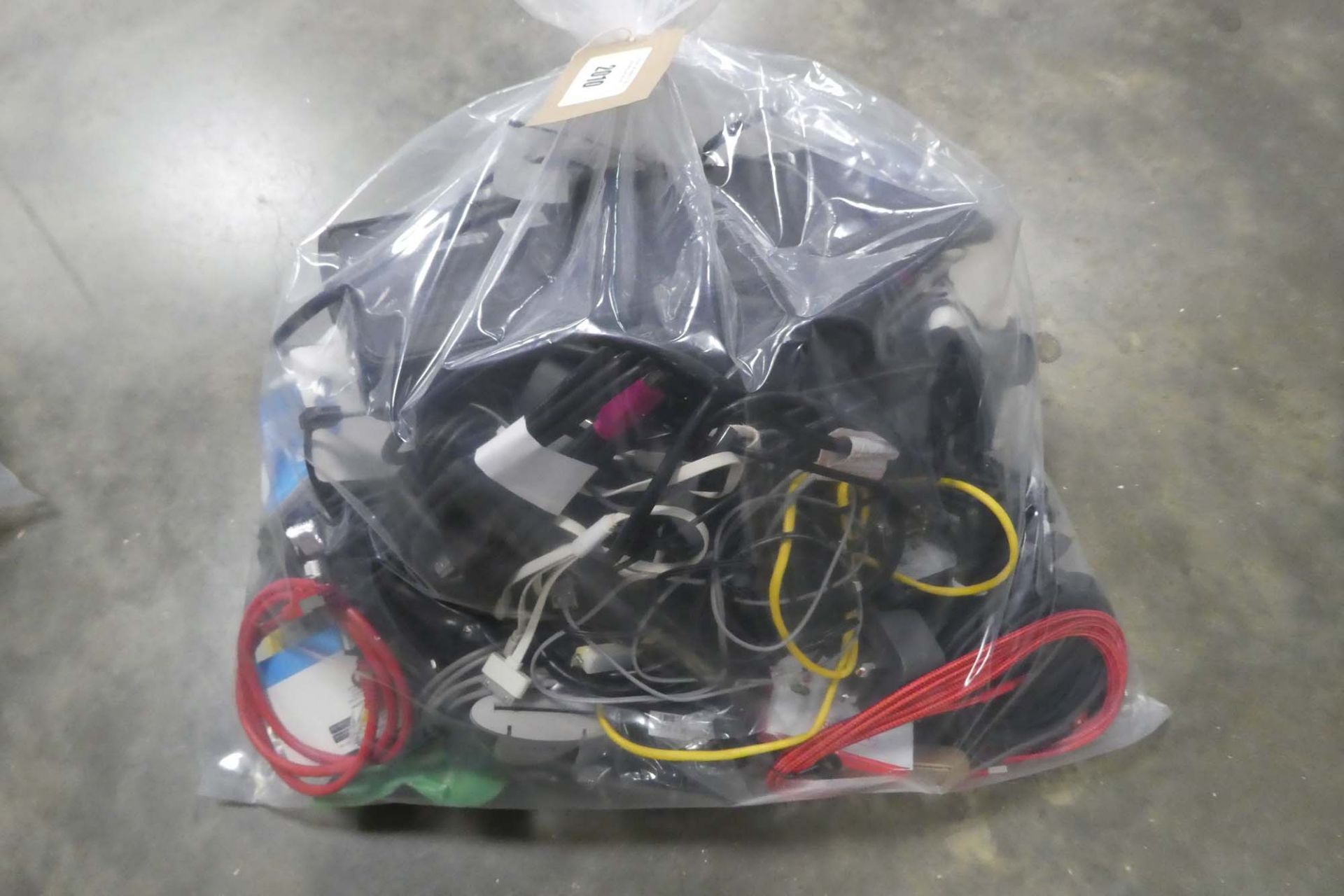 Bag containing quantity of leads, cables and PSUs