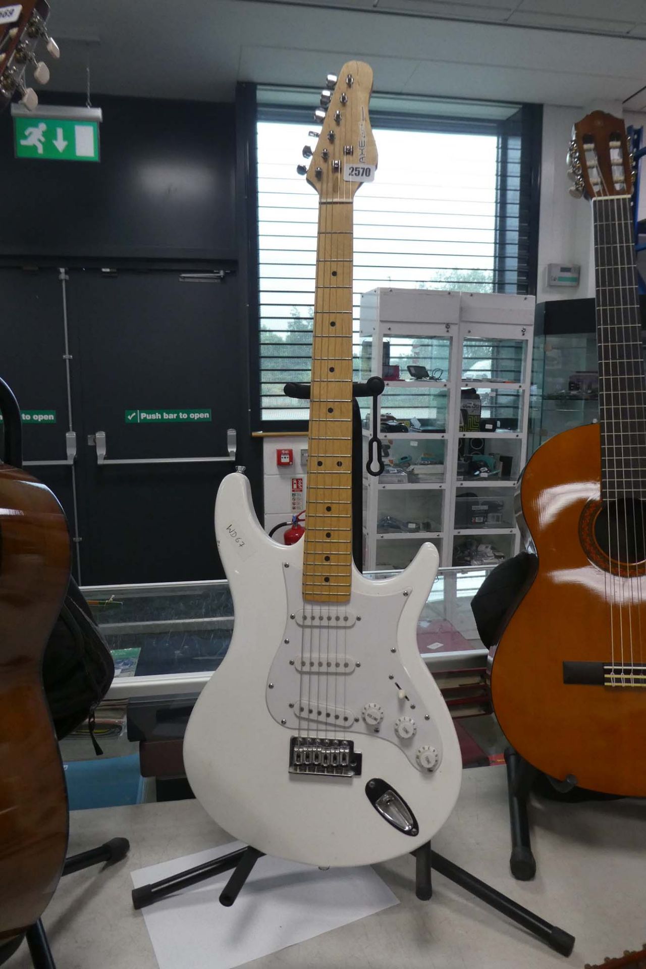 Laxe 393 6 string electric guitar in white by Behringer