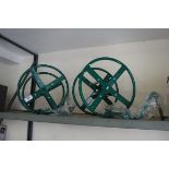 2 green hose reels