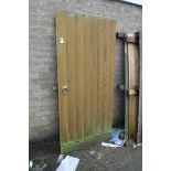 Large wooden fence door