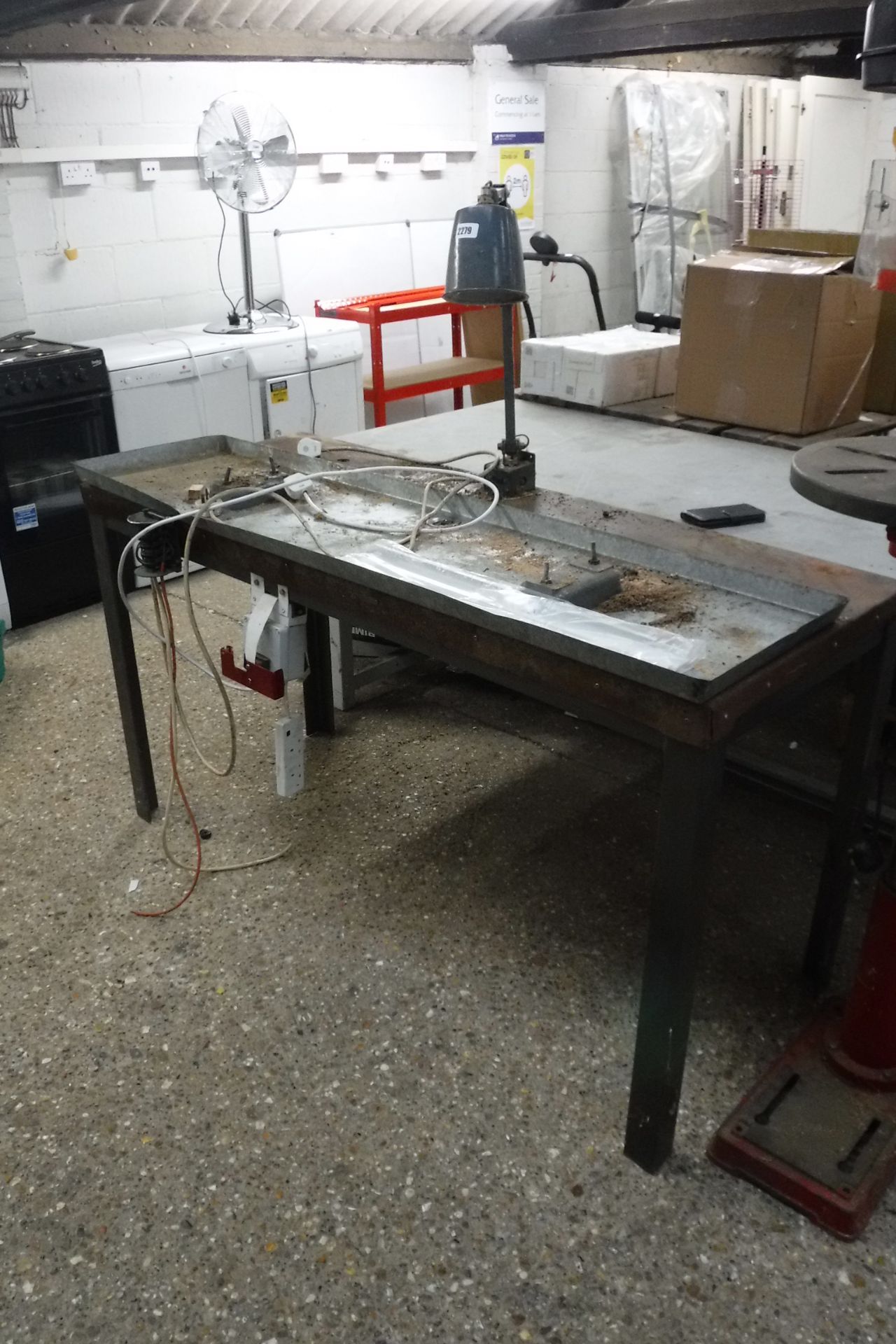 Metal industrial work bench with fixed industrial light