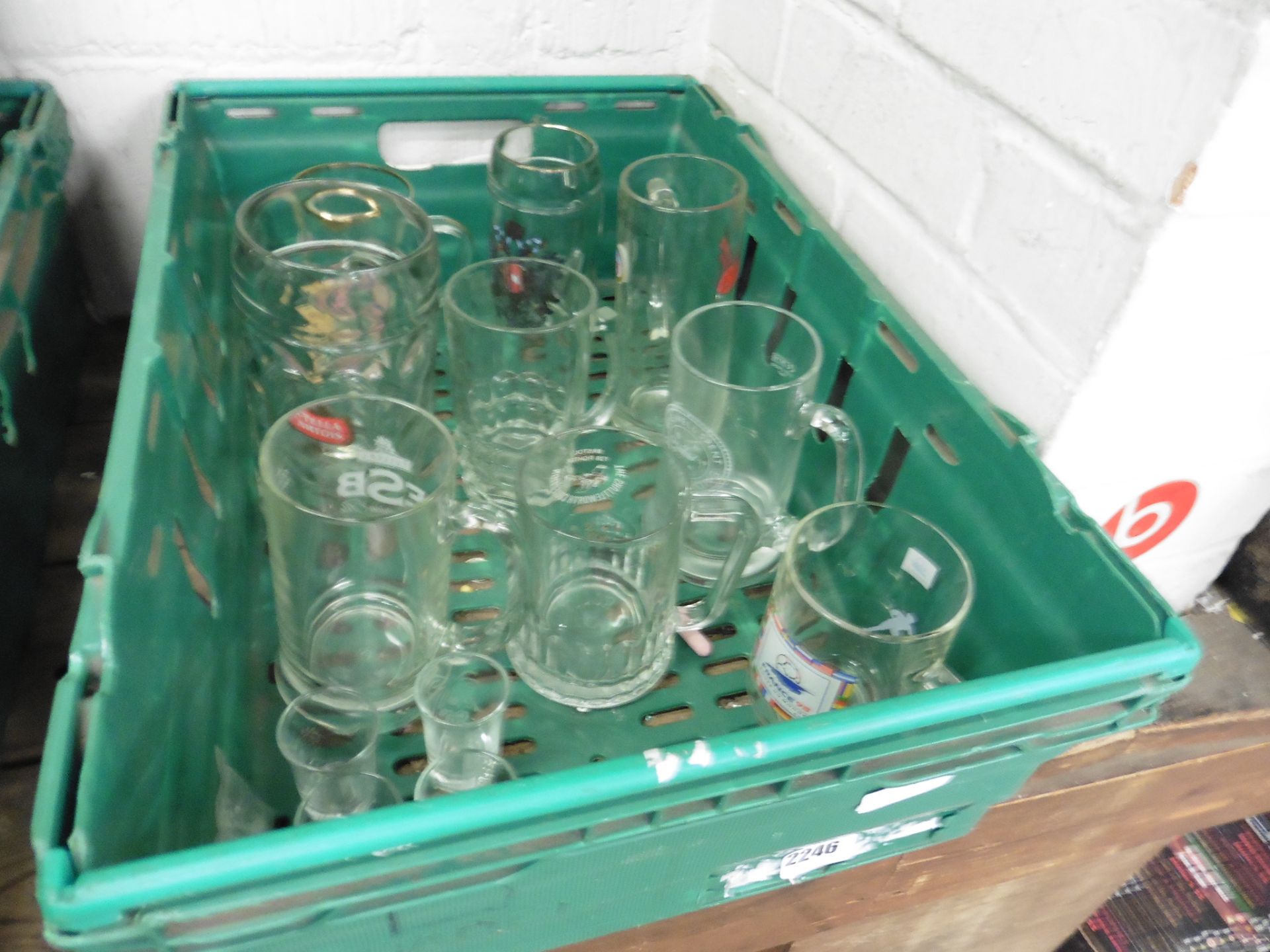 Crate of beer and shot glasses