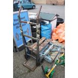 Vintage metal sack barrow and metal saw horse together with a bag of gutter protecters