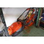 2 Flymo electric lawn mowers and 2 electric strimmers