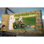 Boxed John Deere ride on toy tractor