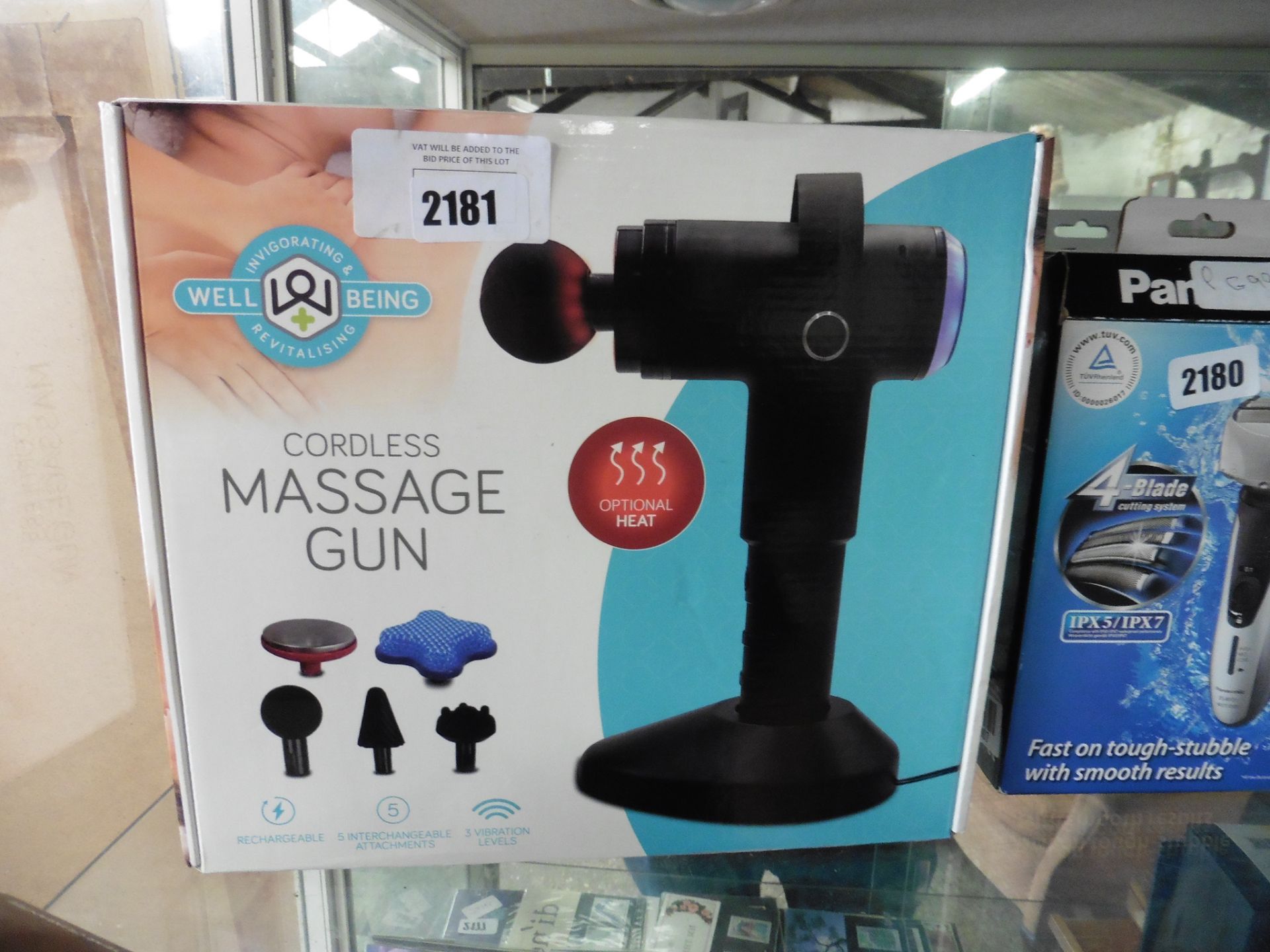 Well Being revitalizing massage gun with box
