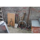 Quantity of garden tools incl. spade, shears, fork, etc. and folding table