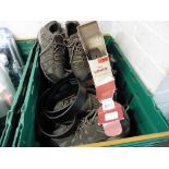 Crate of various Levi belts and trainers