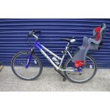 Concept Orchard mountain bike in blue and silver with childs seat