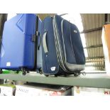 Blue suitcase on wheels