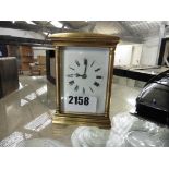 Small brass and glass carriage clock