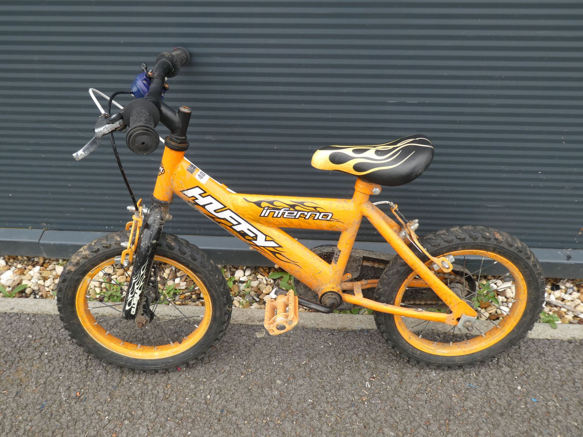 Small orange child's bike