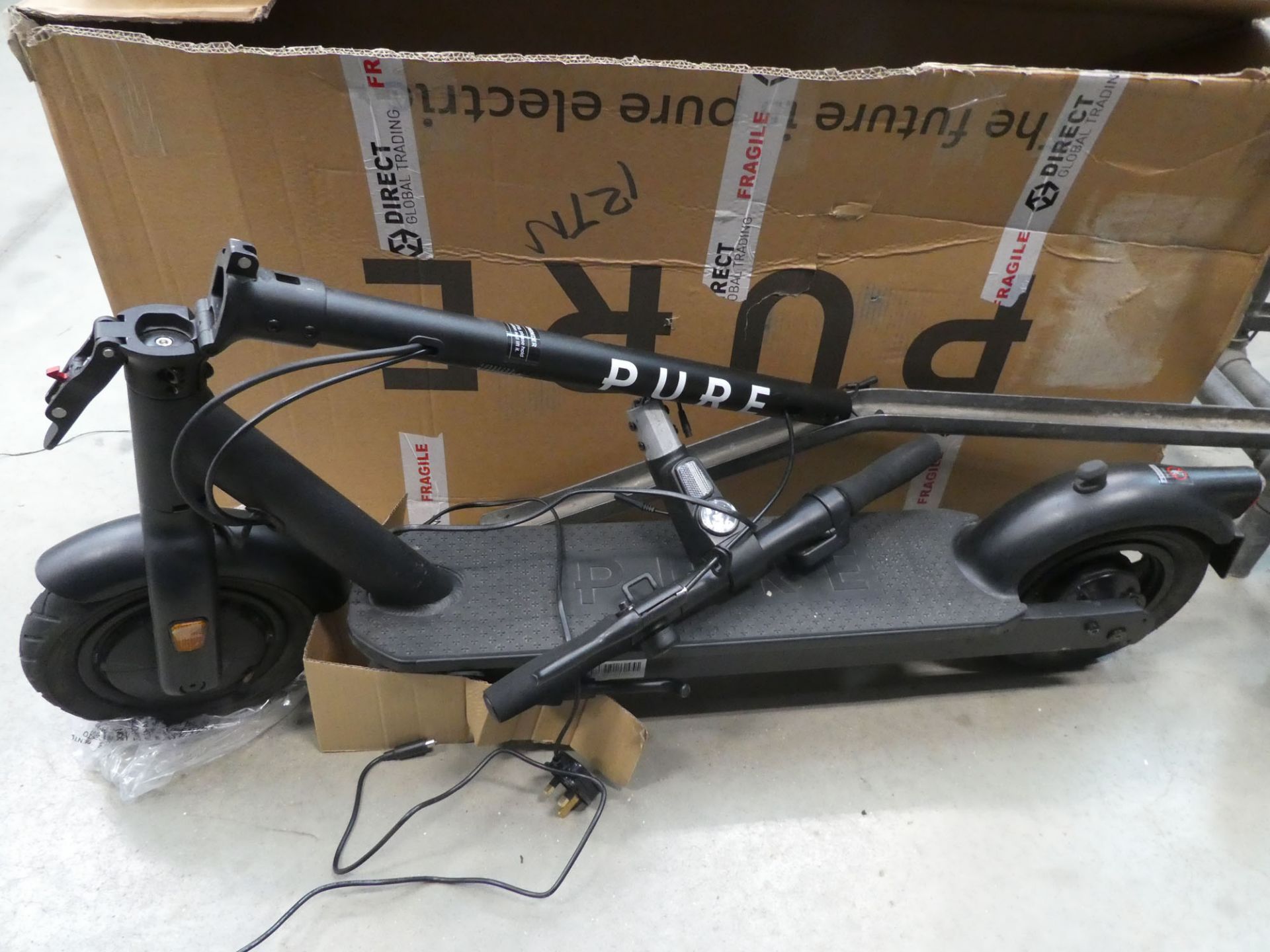 2038 Pura electric scooter in box with charger