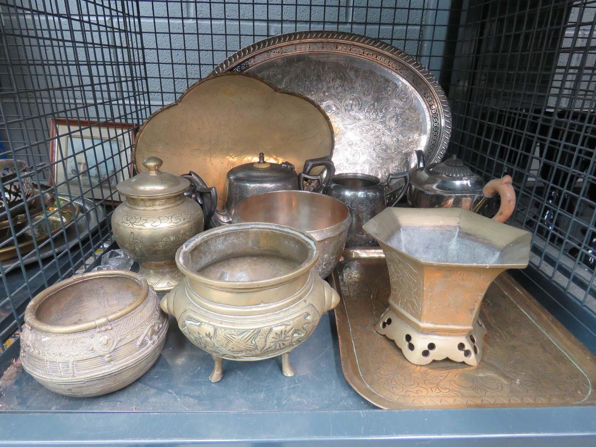 Cage containing brass bowls plus silver plated teapots and a serving tray