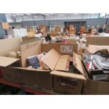 9 boxes containing a large quantity of books, collectors plates, general crockery, loose cutlery and