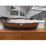 Ornamental wooden rowing boat