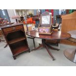 Reproduction mahogany oval coffee table plus a small open bookcase with drawer over