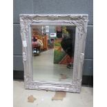 Rectangular bevelled mirror in silver painted frame