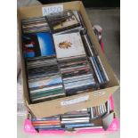 2 boxes containing CD's