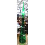 Green glass bottle with stopper