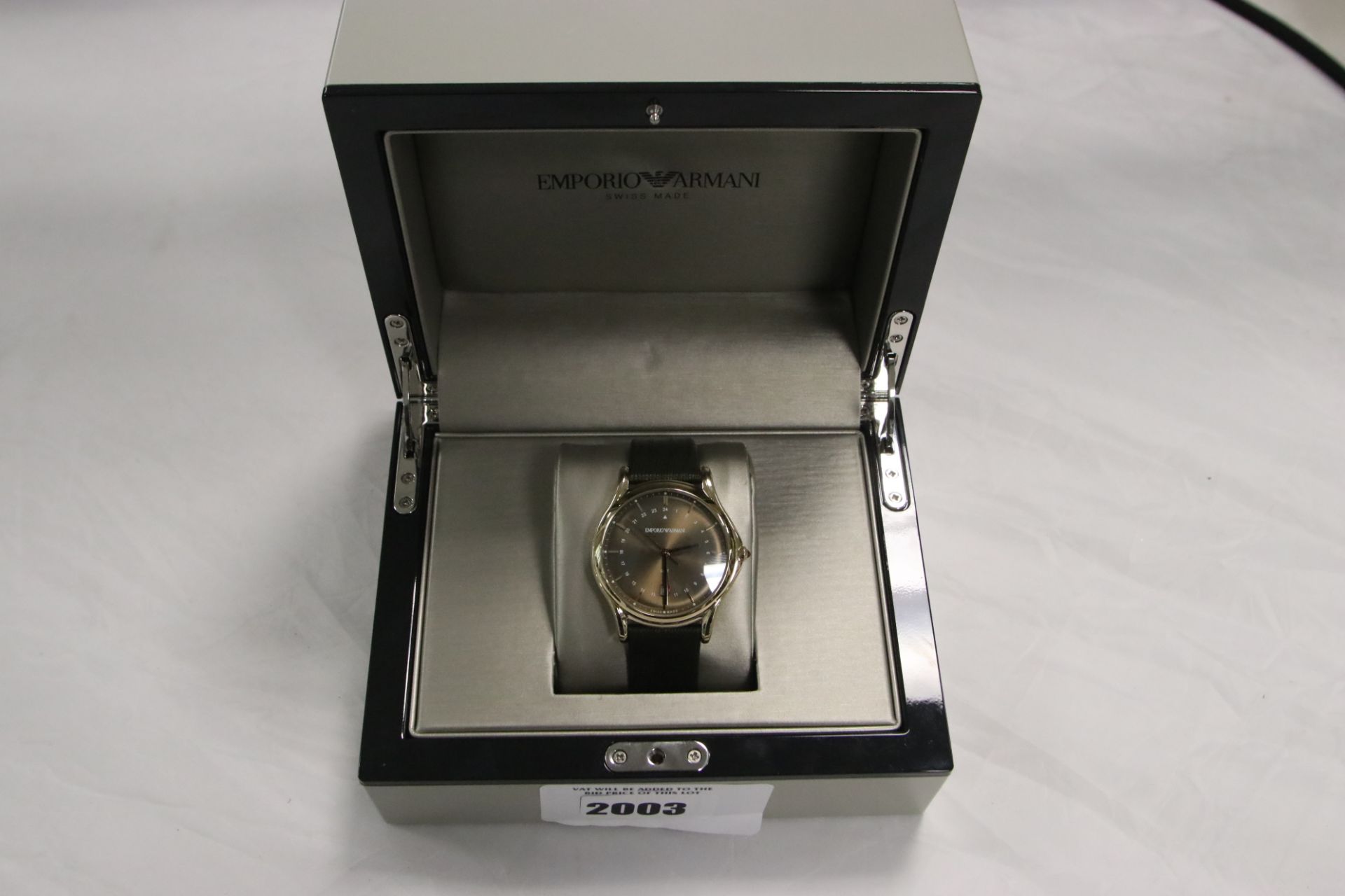 Emporio Armani gents wristwatch with black leather effect strap and gold effect bezel