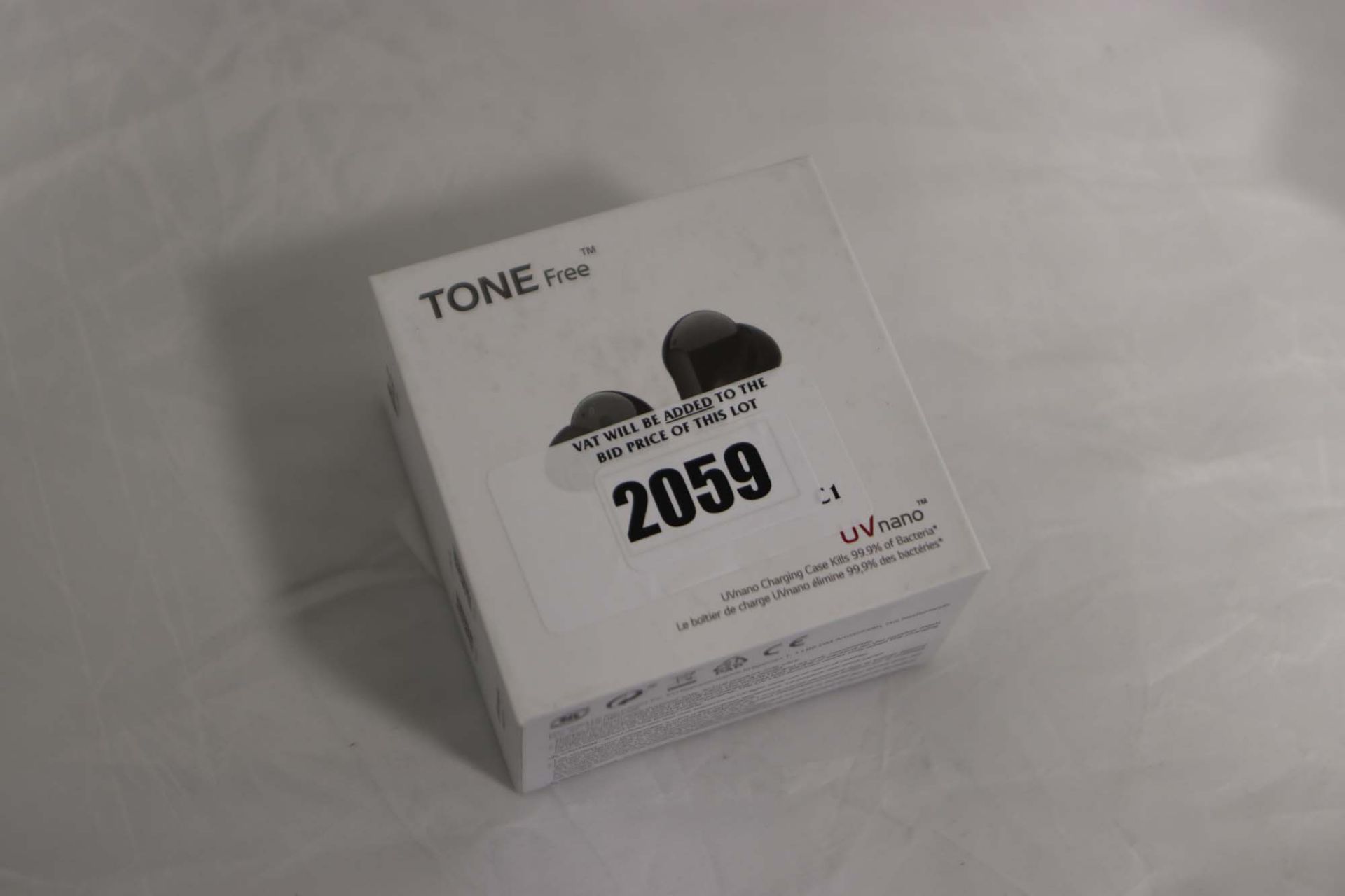 Pair of LG Tone Free earbuds