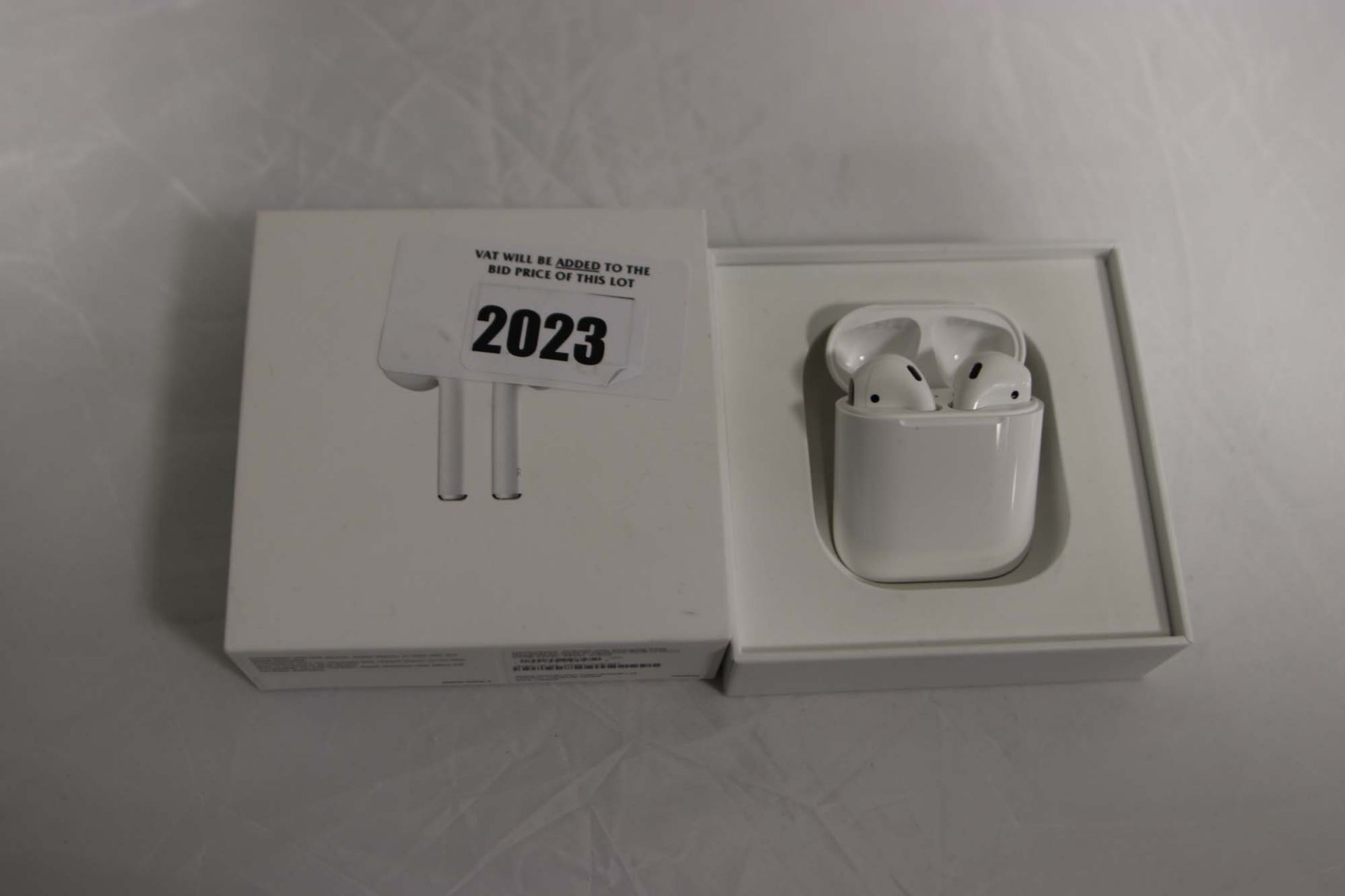 Pair of Apple AirPods in case